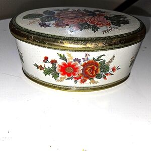 Vintage oval floral Meister tin